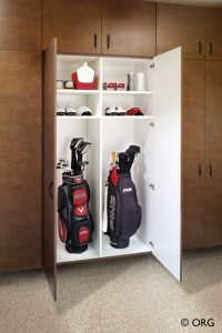 wooden cabinet wall with open doors and golf storage