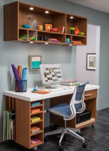 wall shelves and desk with chair
